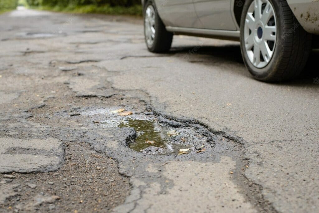 potholes-damage-the-car-windshield