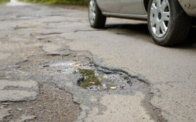 How Can Potholes Damage Car Windscreen?